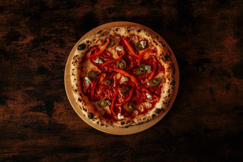 Relaxed outdoor patio seating at Anthony's coal fired pizza