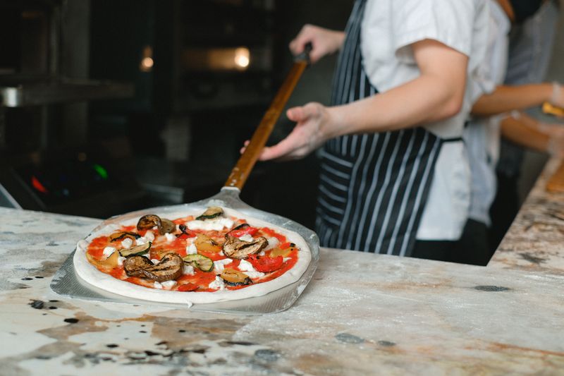 Anthony's coal fired pizza — signature Margherita with charred crust